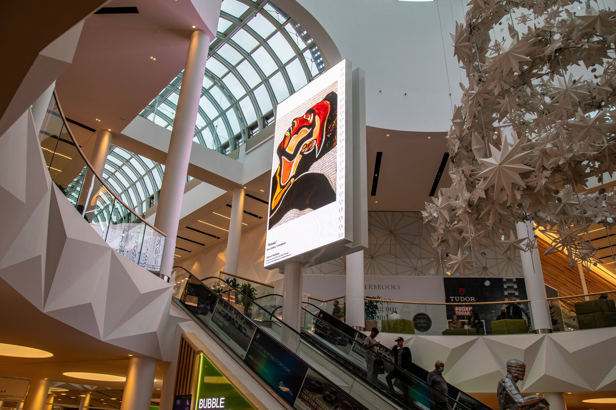 Malls Live displaying POCC advertisement in a shopping centre