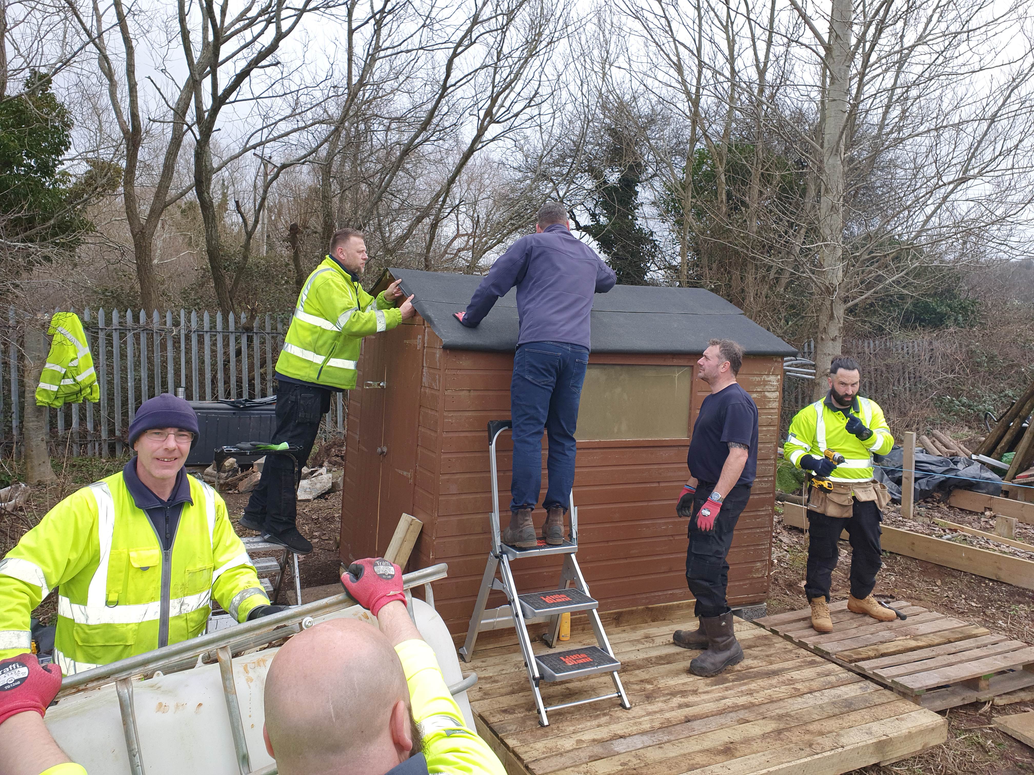 Bauer Media Outdoor volunteers building a shed