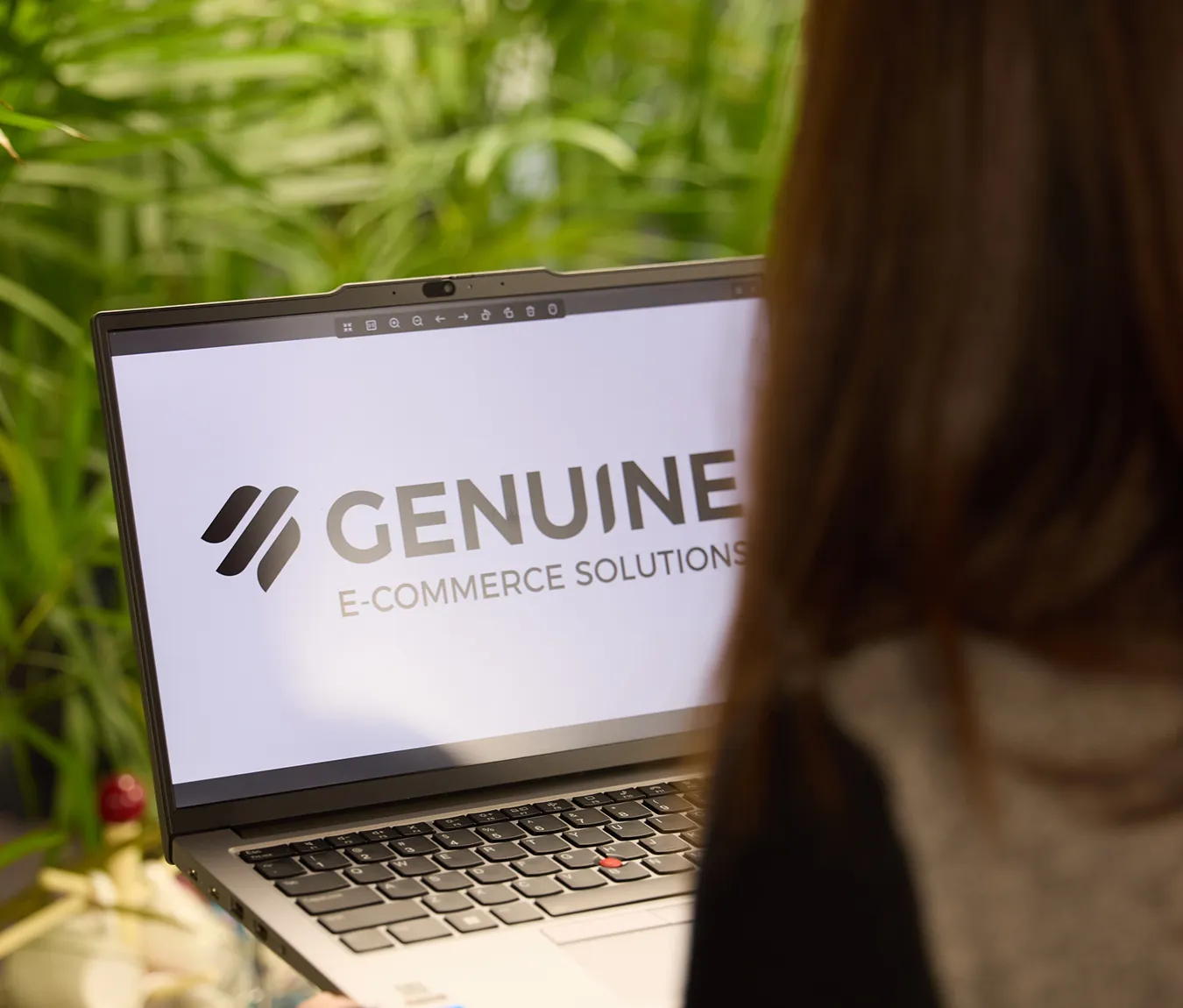 image of laptop with Genuine logo