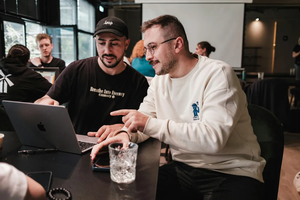 2 women talking while shopping