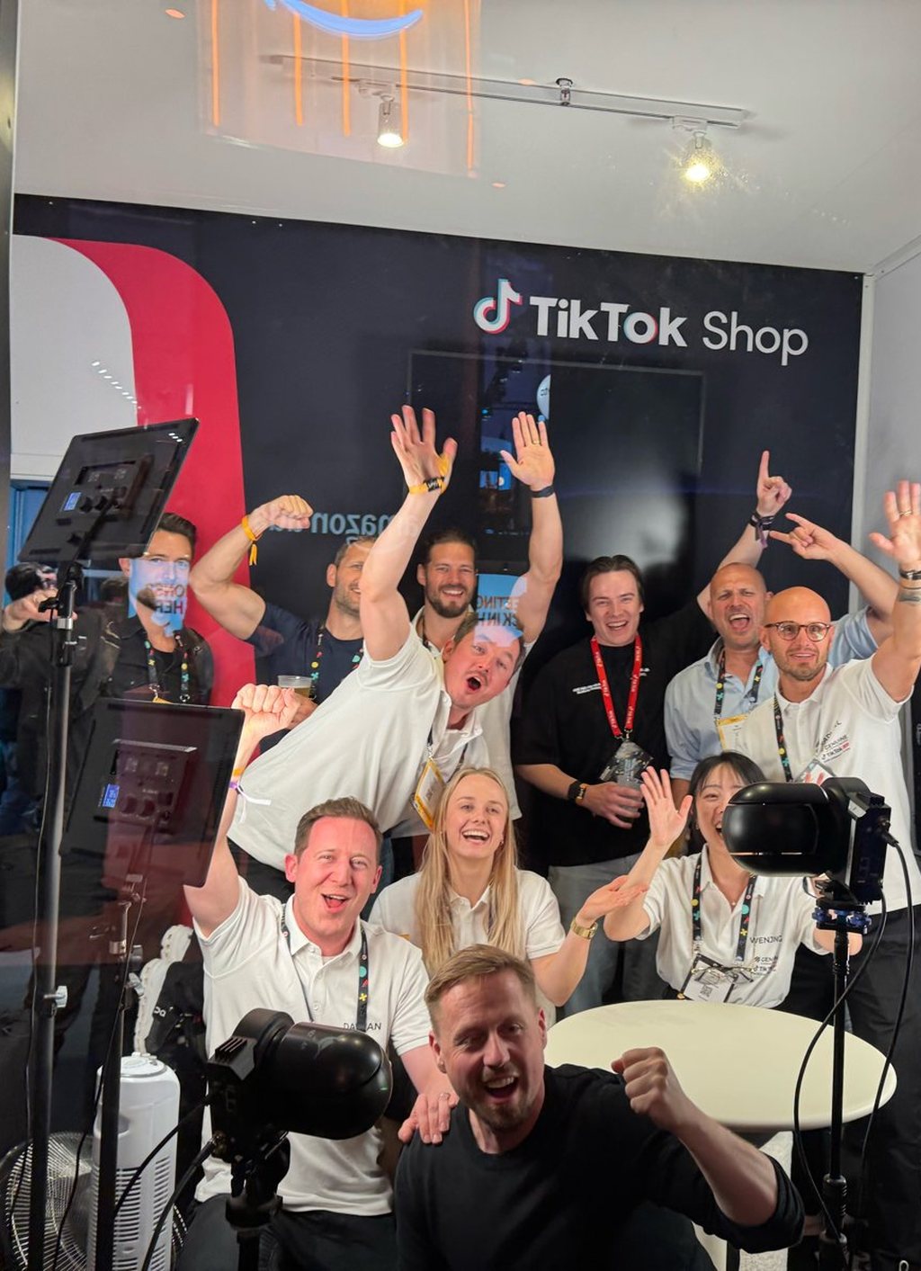 GENUINE team celebrating in a TikTok Shop live studio