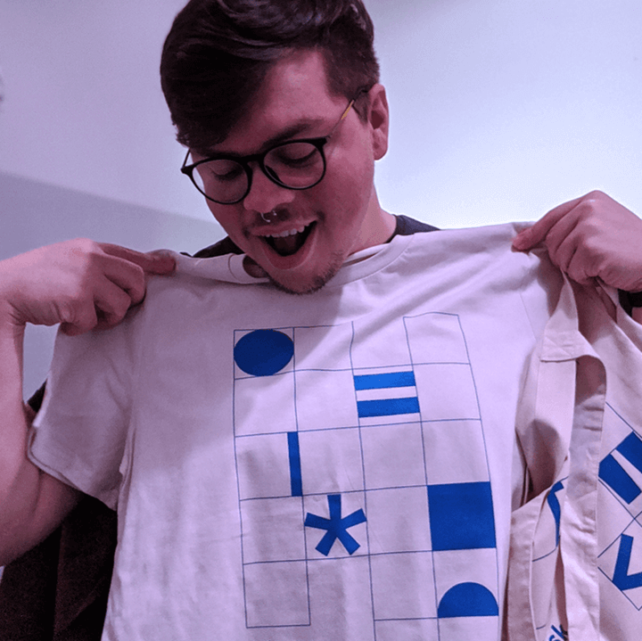 Lisk.js, photo of man holding thsirt