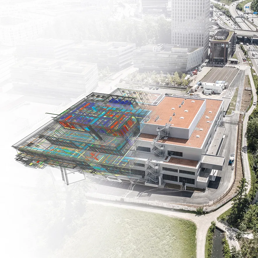 Industrial construction project with transition from rendering to real building, realized by IE.
