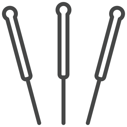 Three acupuncture needles with rounded handles arranged side by side on a white background.