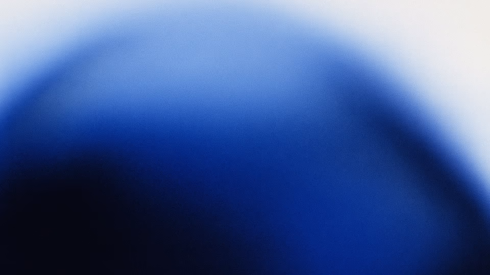 Dégradé flou de bleus foncé à clair sur un fond clair.