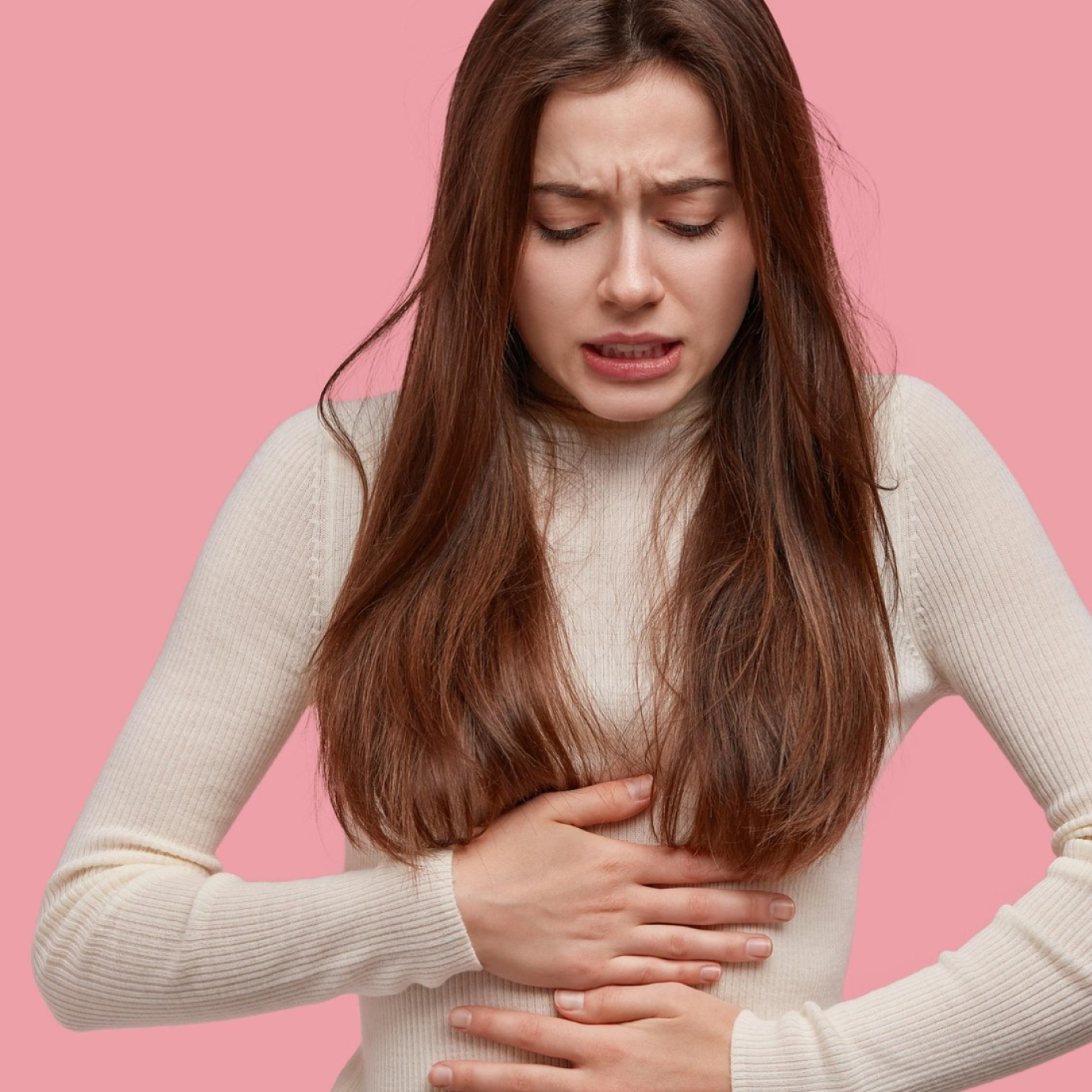 Frau mit IBD Symptomen