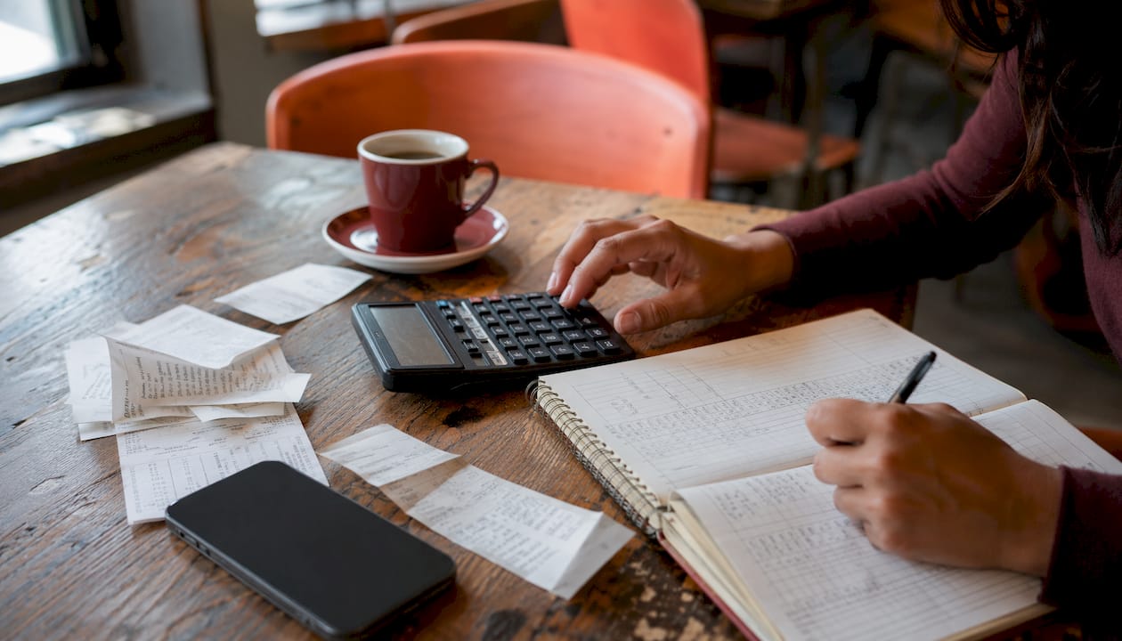 Receipts and calculator for salon tax expenses