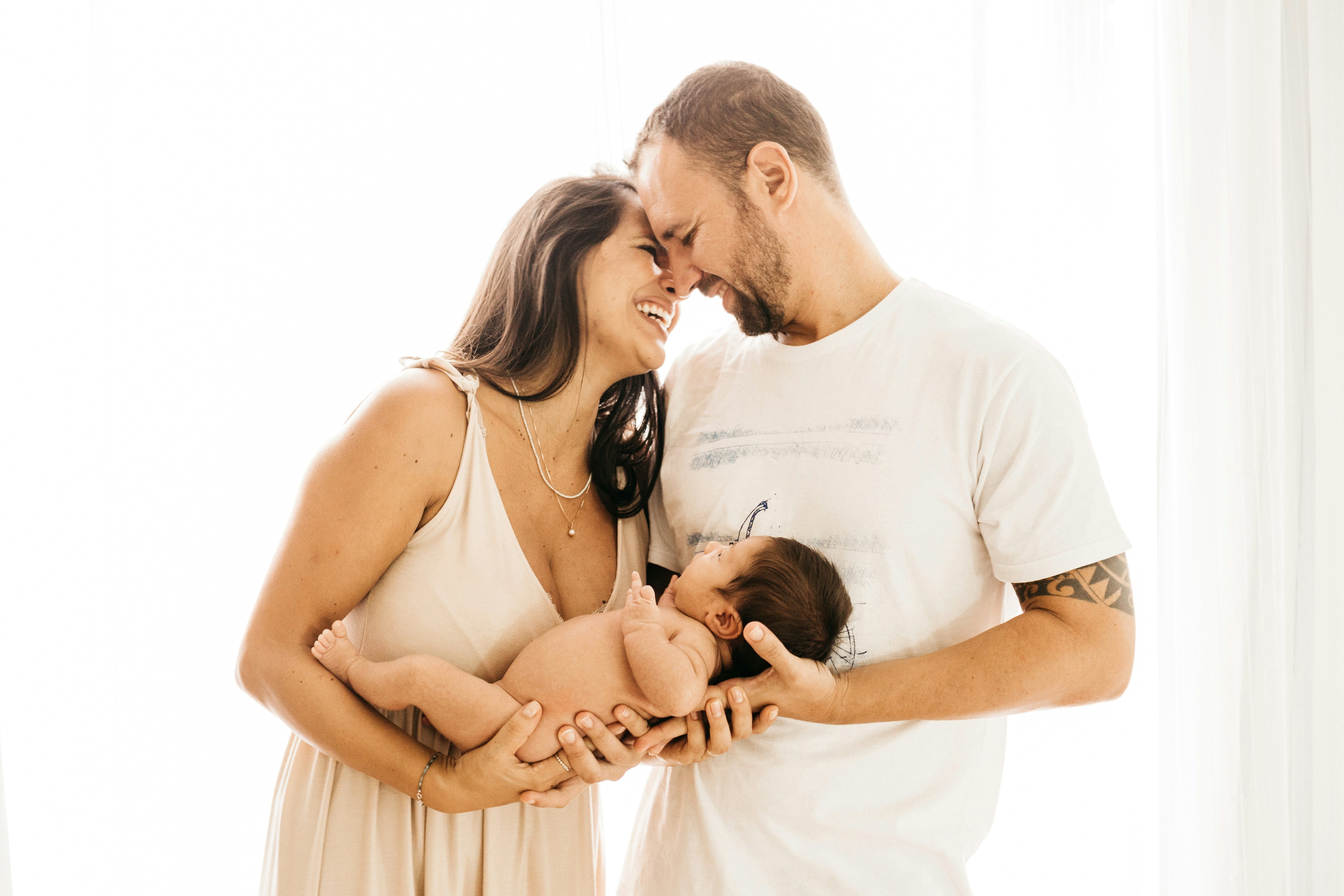 Newborn baby wrapped in hospital blanket after successful IVF treatment