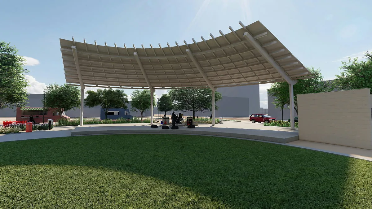 Rendering of a curved shade pavilion stage beside a grassy lawn.