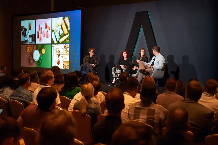 people talking on a stage