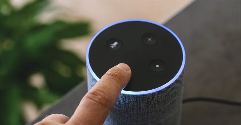 pressing button on speaker