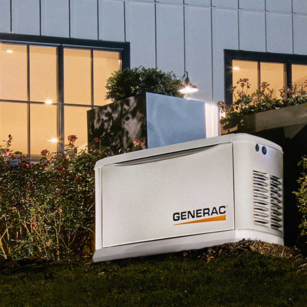 Generac whole home generator in front of a white home