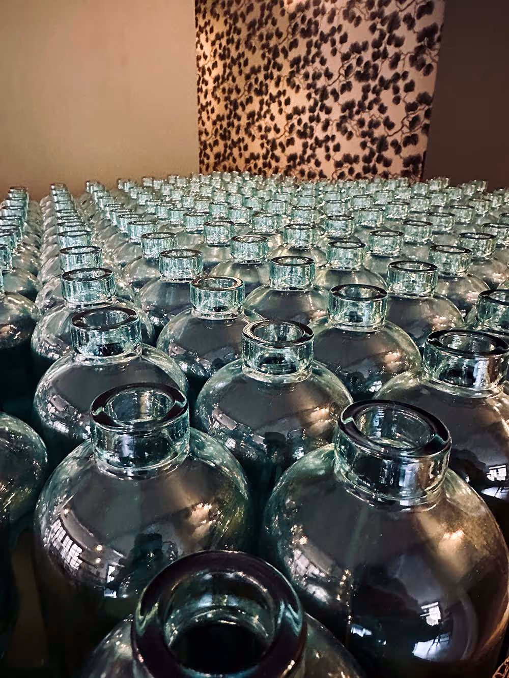 loads of gin bottles waiting to be filled