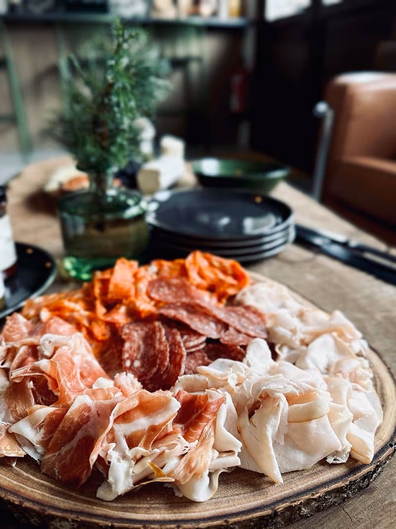 a platter of cold meat cuts