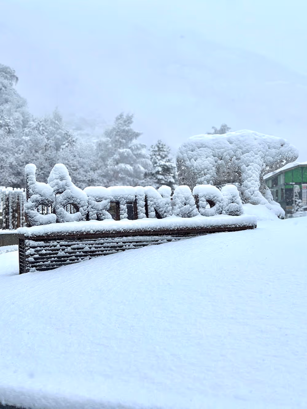 the la cortinada roundabout covered in snow