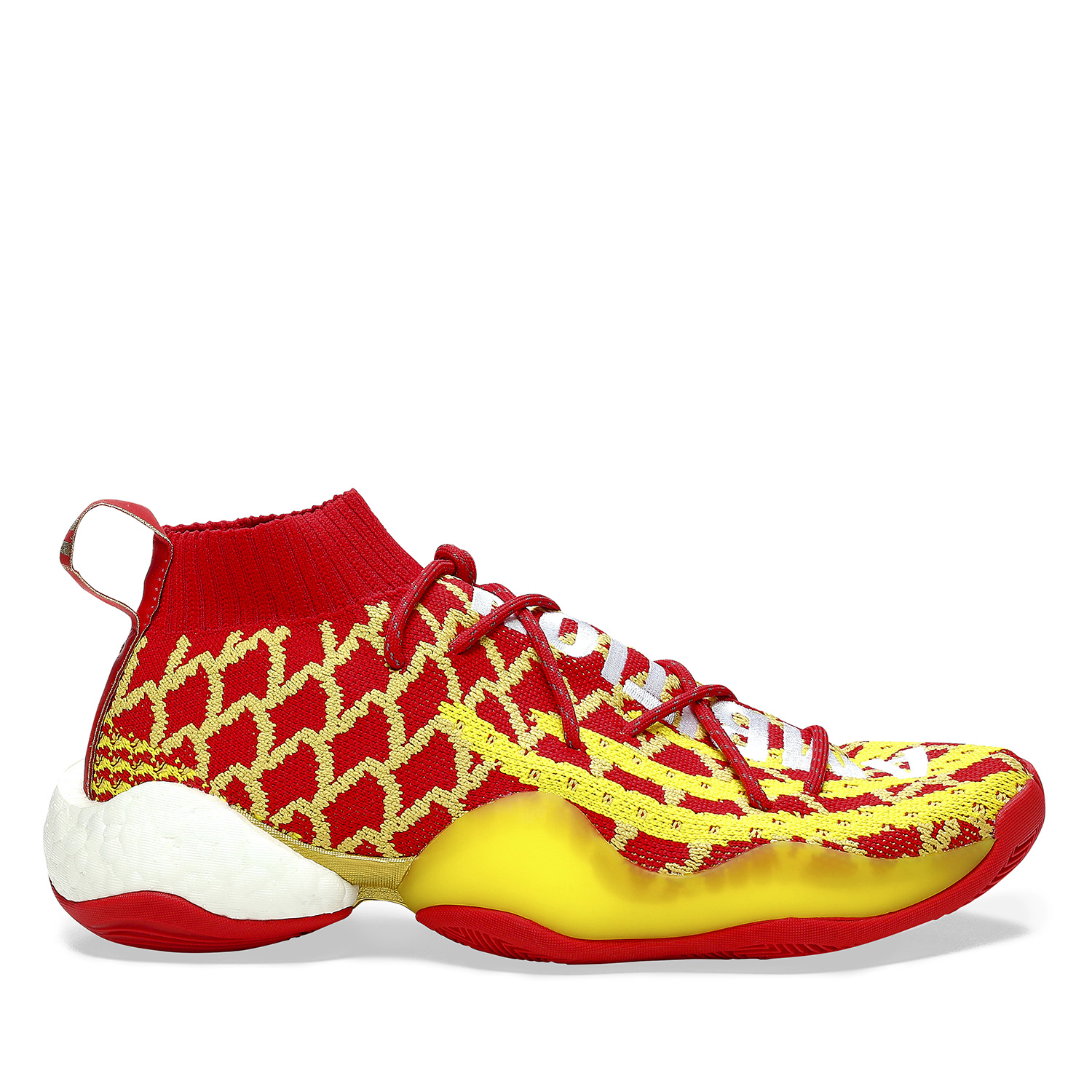 Red and yellow Adidas sneaker - profile view