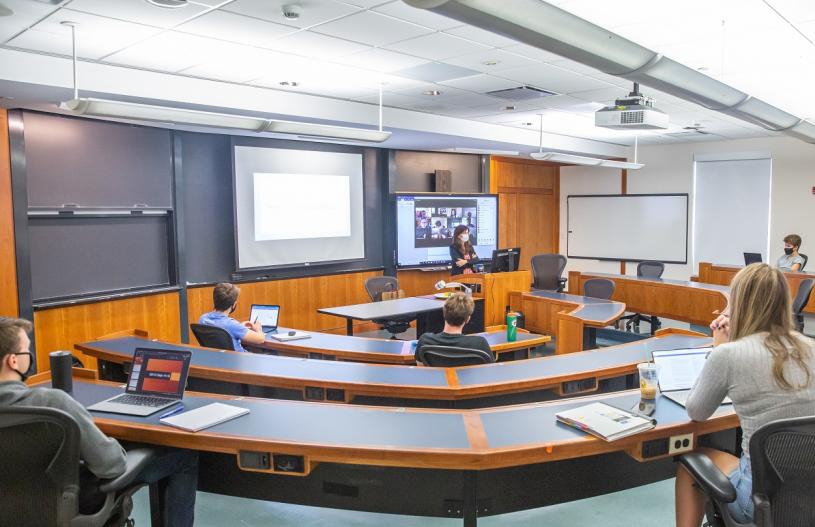 instructor teaching in classroom.