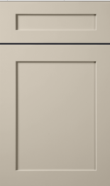 Close-up of a beige cabinet door with a rectangular panel and trim detailing.