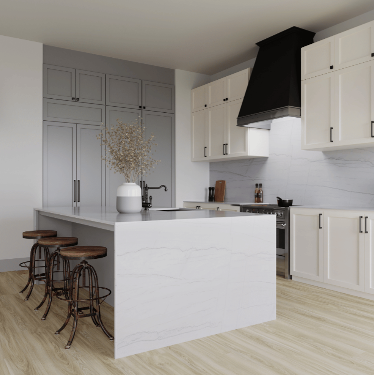 Modern kitchen with white cabinets, stainless steel appliances, a large marble island, and hanging pendant lights.
