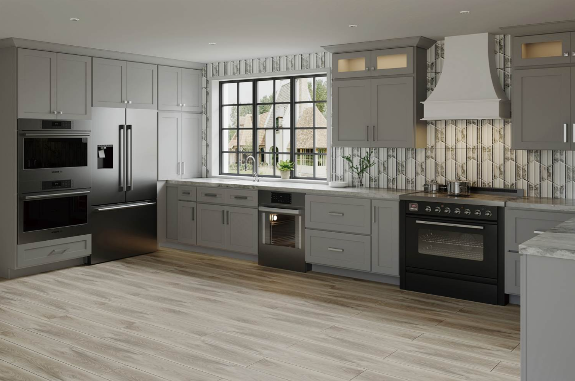 Gray kitchen cabinetry with a built-in wine rack holding three bottles and four hanging wine glasses above a stainless steel faucet and white countertop.