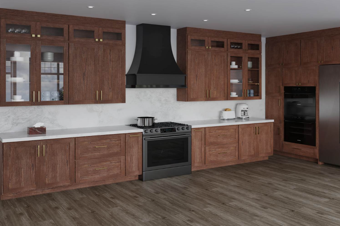 Gray kitchen cabinetry with a built-in wine rack holding three bottles and four hanging wine glasses above a stainless steel faucet and white countertop.