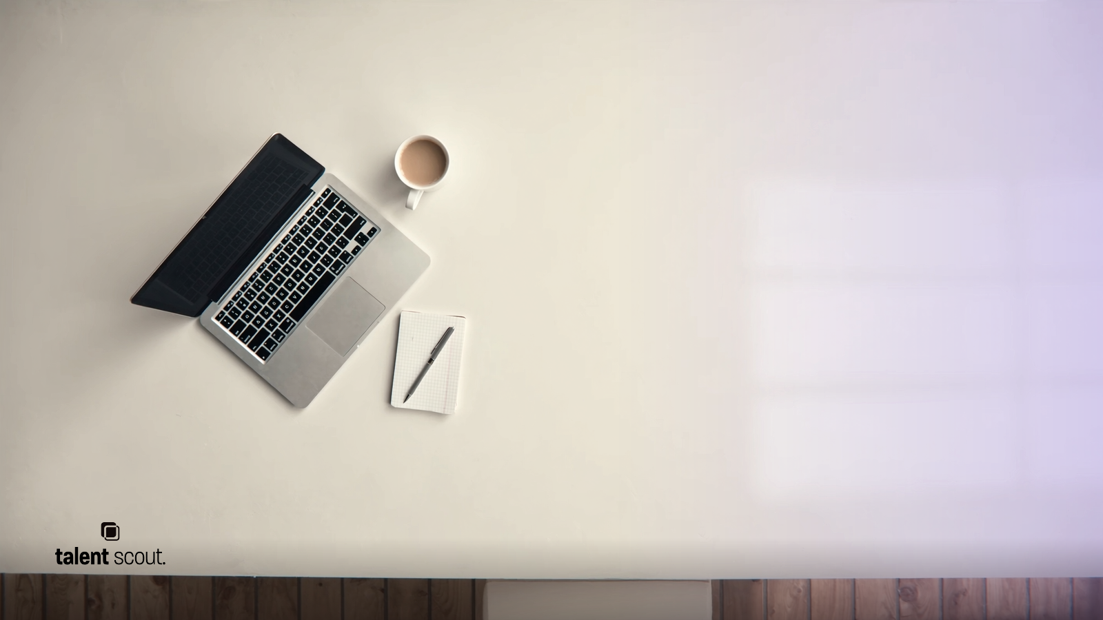 Nearshore staffing guide hero, clean editorial workspace with laptop and notebook for Talent Scout blog post on U.S. agencies hiring from Latin America