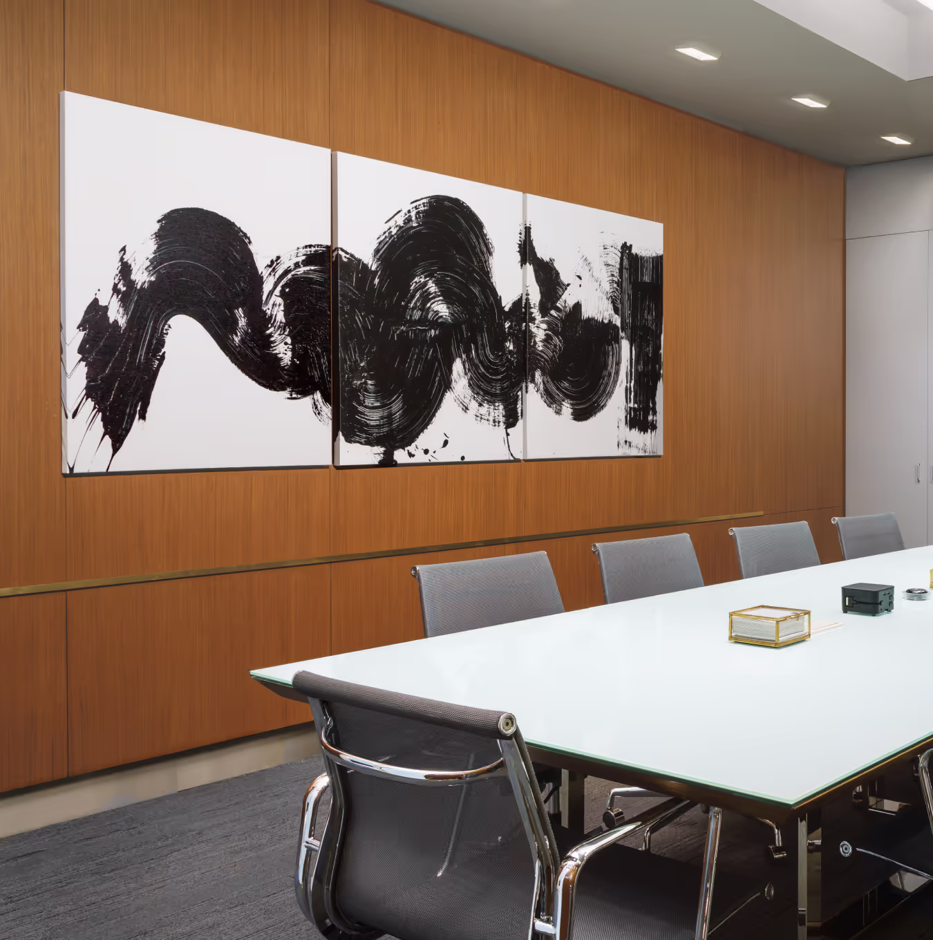 three paintings in business center
