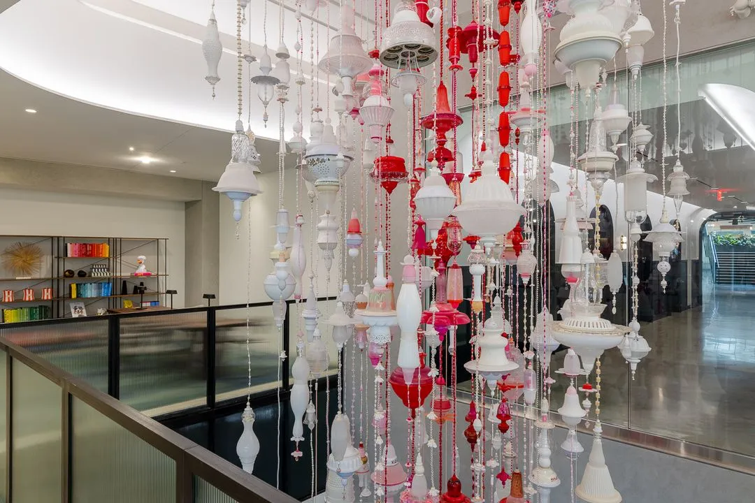 white and red hanging art installation in office space