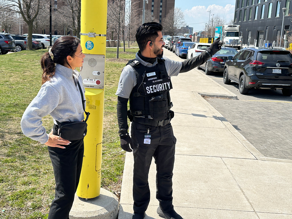Security personnel from Blackbird Security providing directions