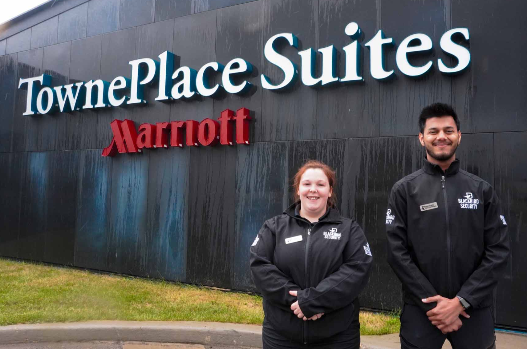 a group of Blackbird Security guards in front of the marriot hotel at saskatoon