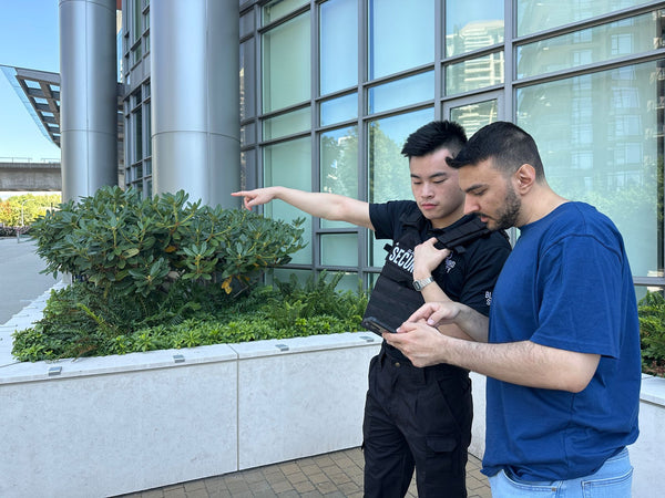 Blackbird Security guard giving directions to person