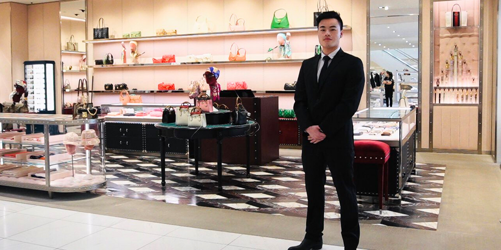 Plained Clothes Blackbird security guard standing in retail location