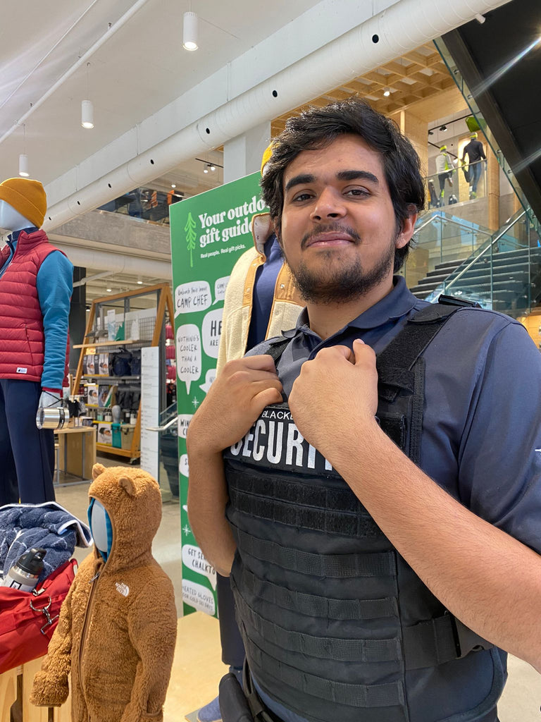 Blackbird Security guard on duty inside the MEC retail location