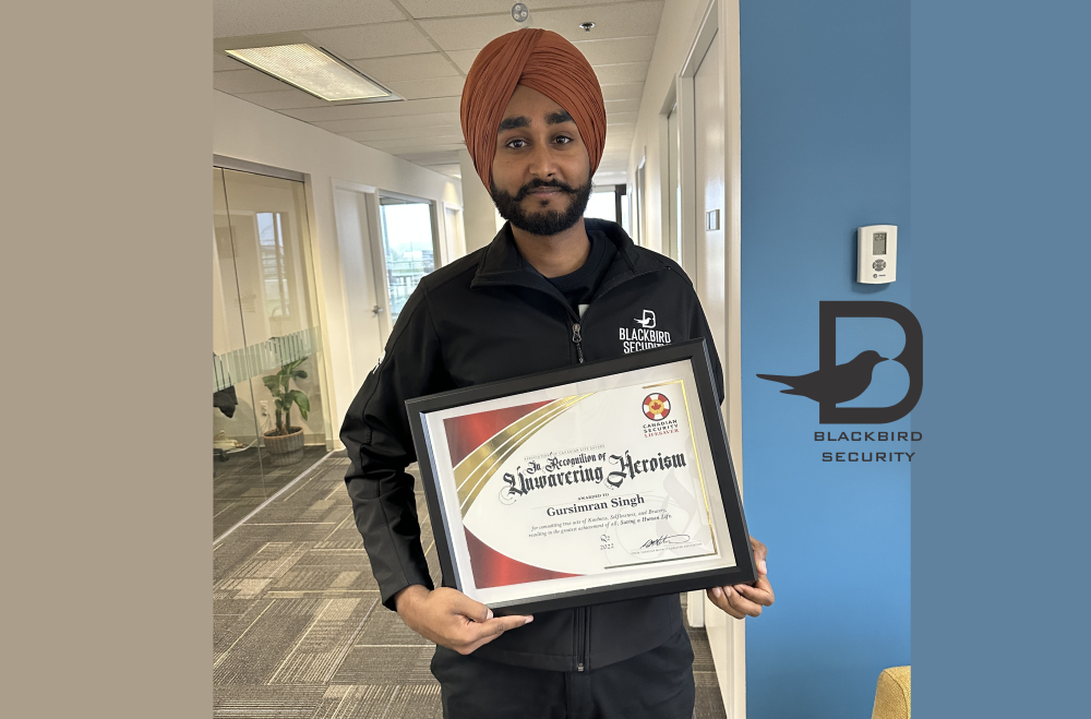 Blackbird Security Tactical Security Guard, Gursimran Singh, receives an award for his life-saving fire response.