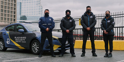 Four Blackbird security in front Mobile patrol car