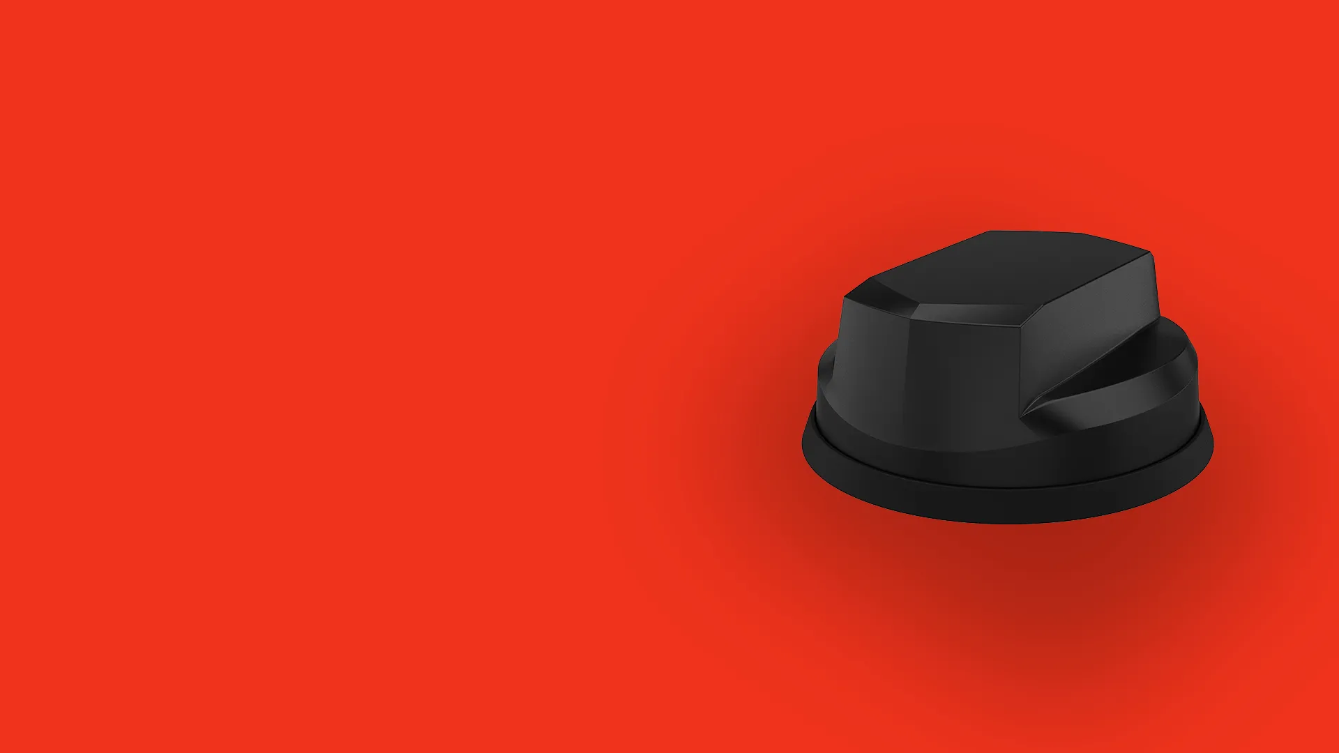 Black, angular control knob on a red background.