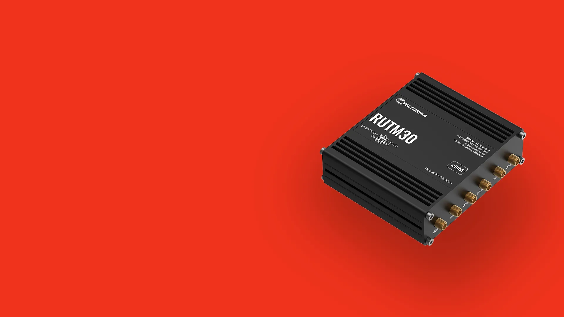 Black Teltonika RUTM30 industrial communication device with six antenna connectors on a red background.