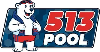 Smiling cartoon polar bear wearing red goggles and red swim trunks, holding a blue towel, next to text '513 POOL' in red and white.