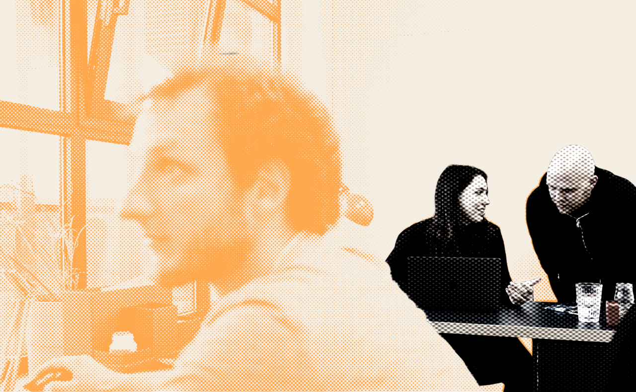 three people, two men and one woman, working in an office together