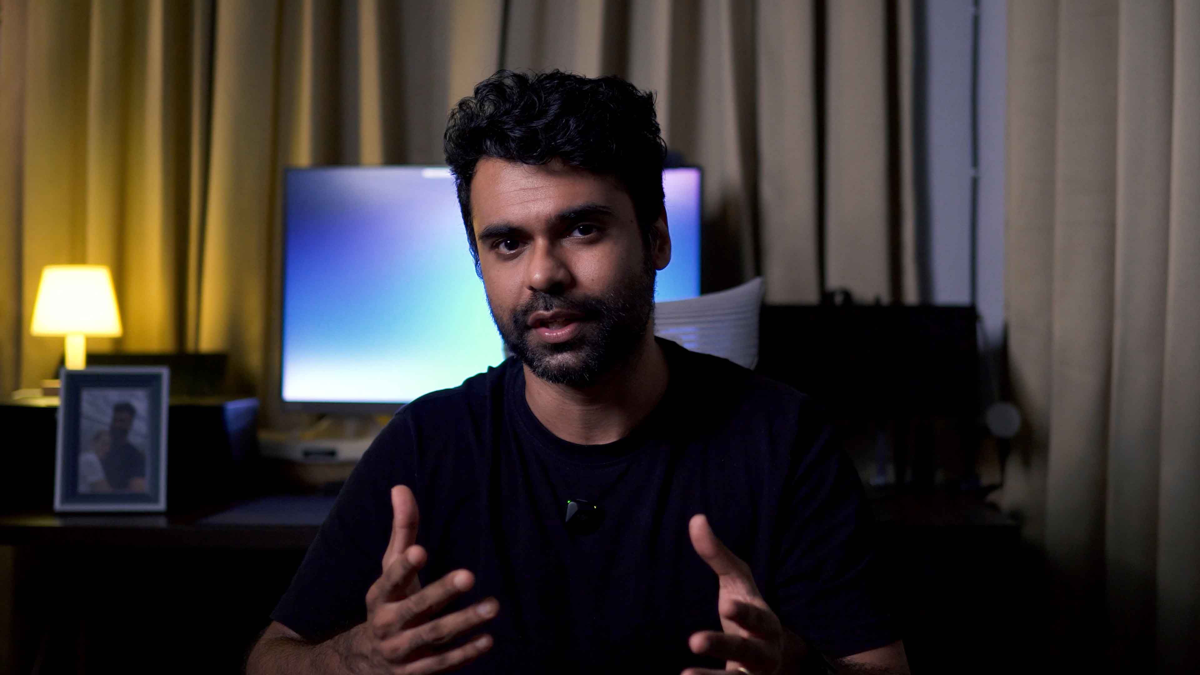 Hitesh Godhwani speaking infront of a camera.