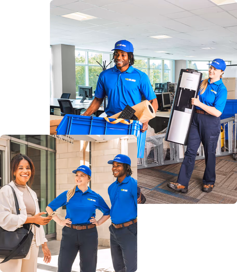 Two 1-800-GOT-JUNK? team members removing business junk and talking with business owner