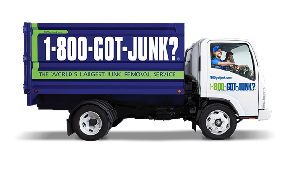 Side view of a 1-800-GOT-JUNK? truck and tagline The World's Largest Junk Removal Service.