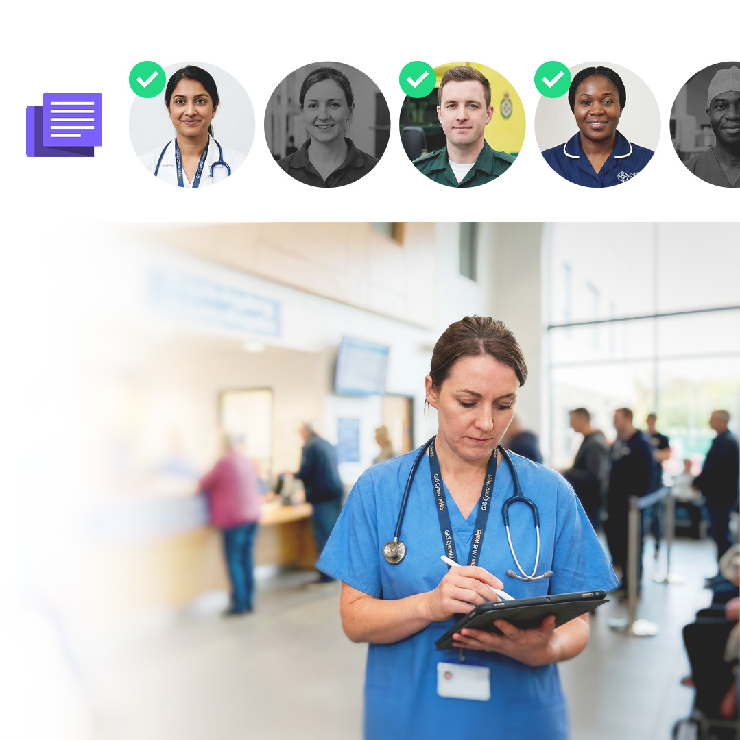 Nurse in blue scrubs using a tablet in a busy hospital waiting area.