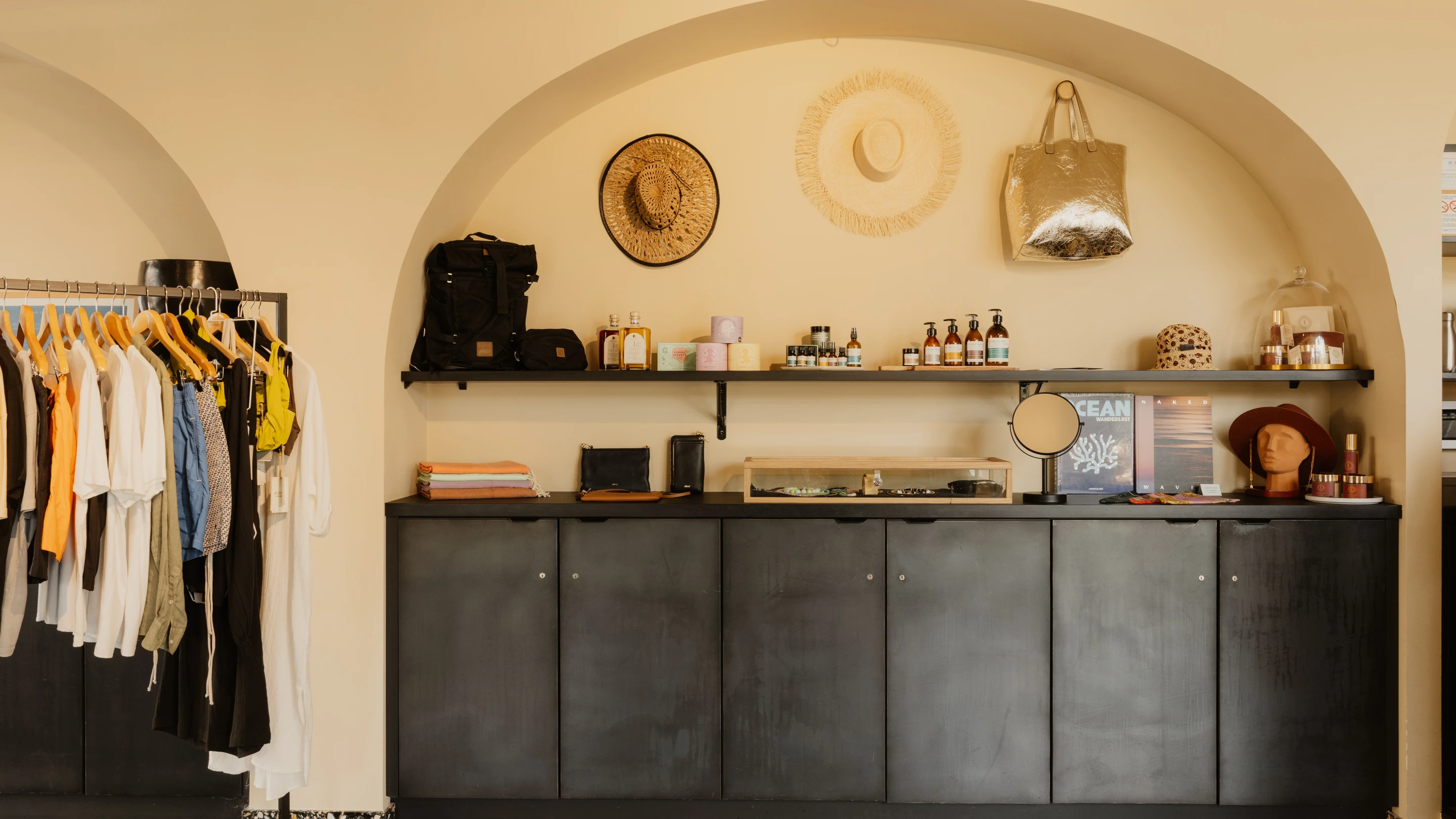 Curated collection of luxury lifestyle goods, apparel, and accessories inside the boutique at Hôtel Régina Experimental.