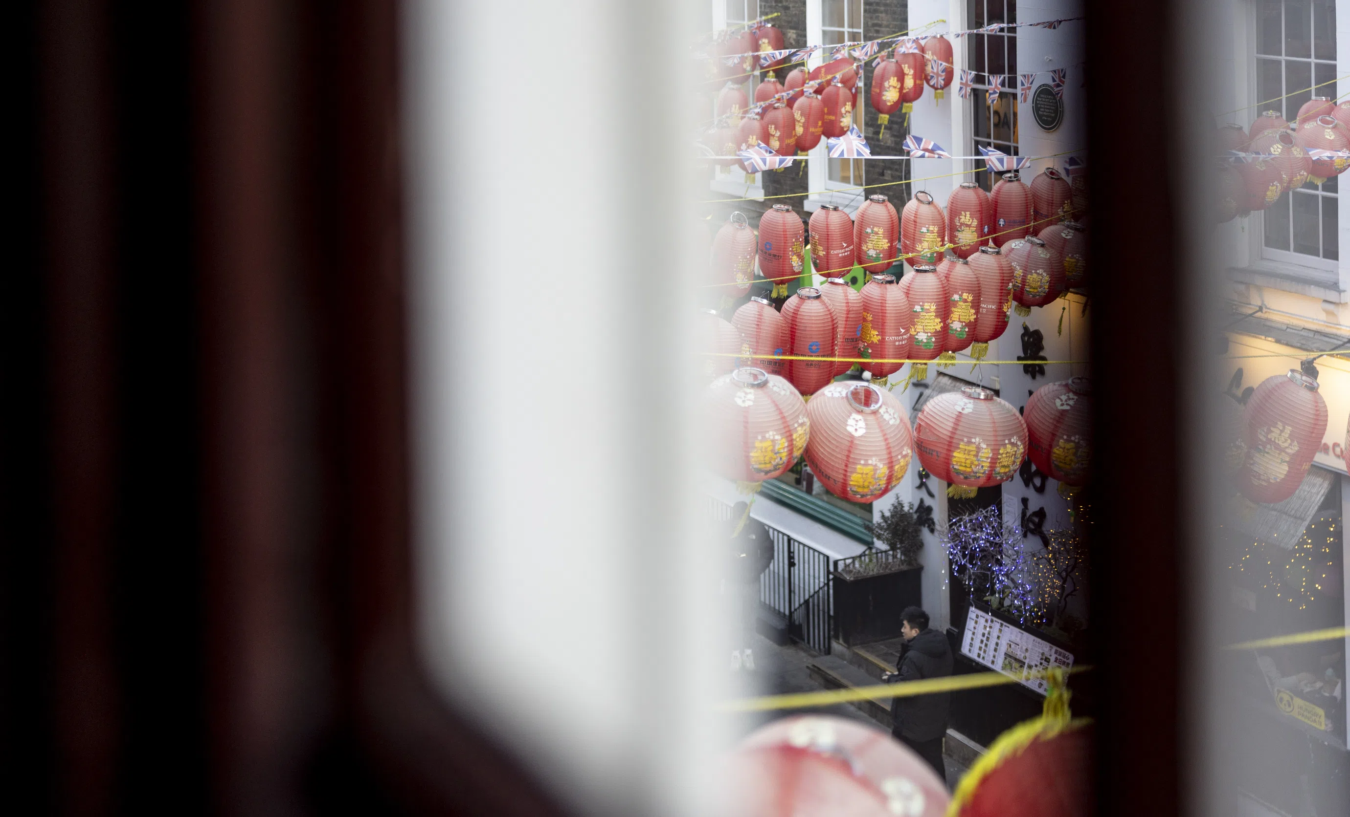 Red lanterns hanging over a street in Chinatown, London, Experimental Group.