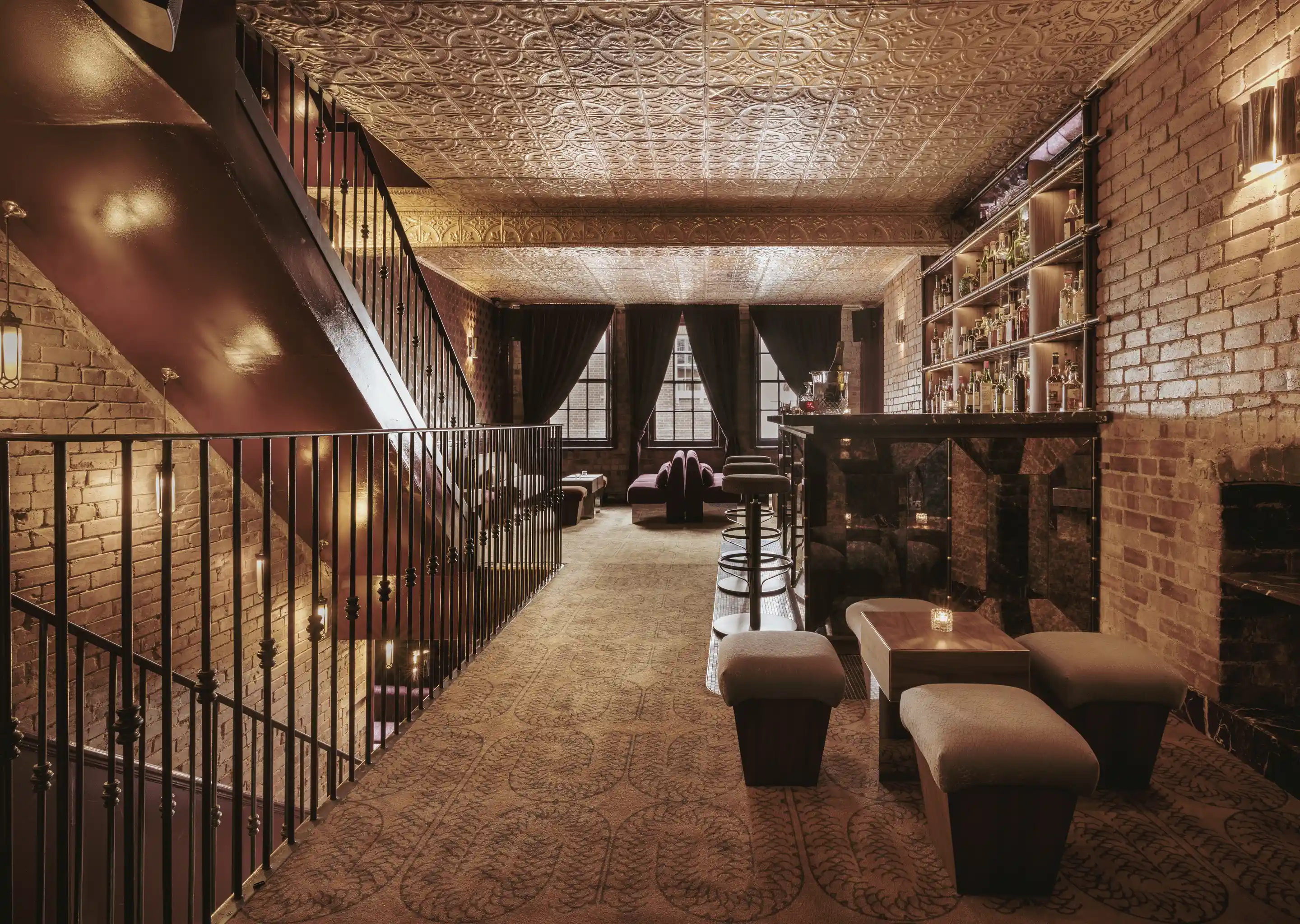 Overview of a sophisticated cocktail bar with staircase, Experimental Group.