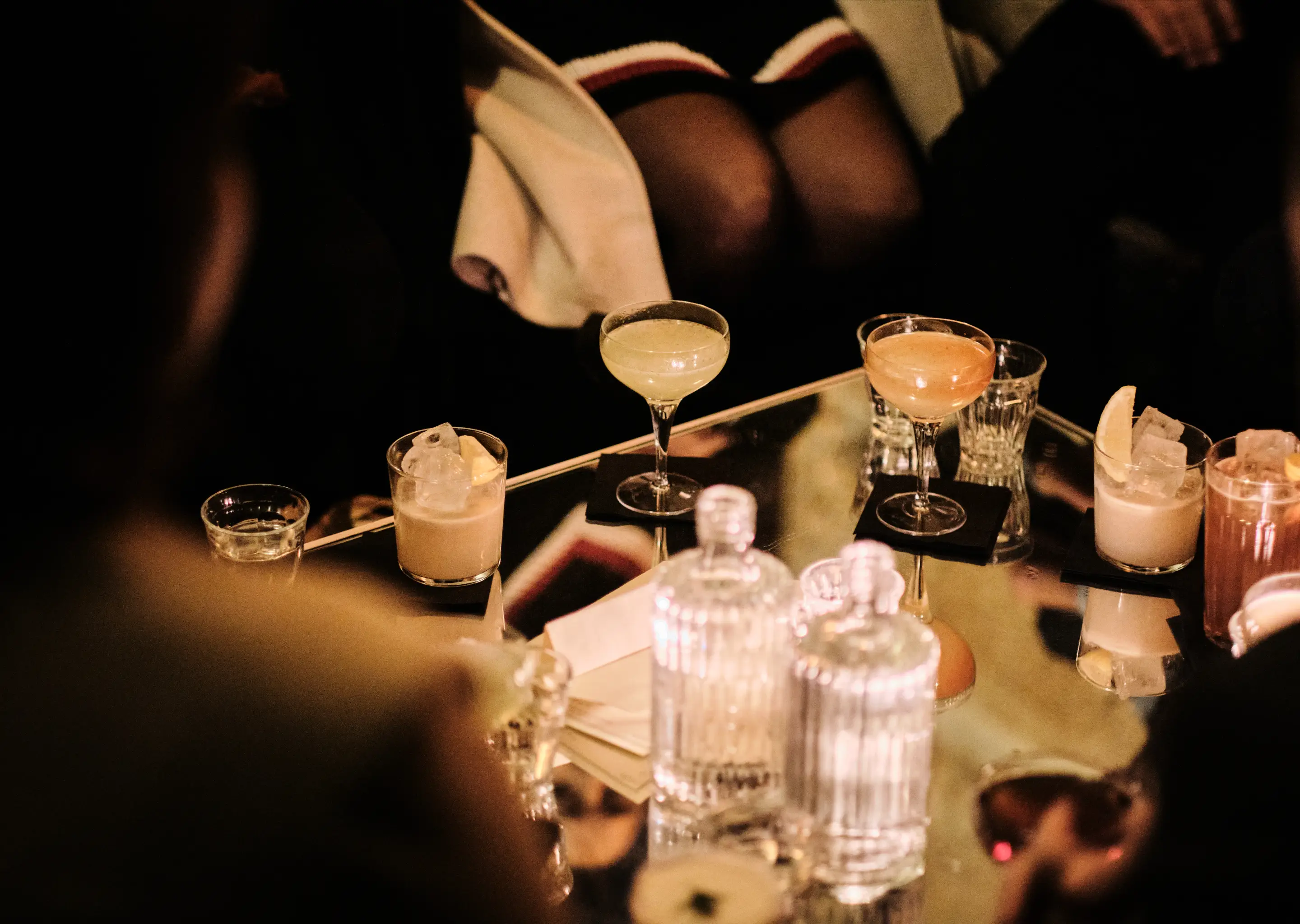 Craft cocktails served in an Experimental Group lounge, the art of mixology.