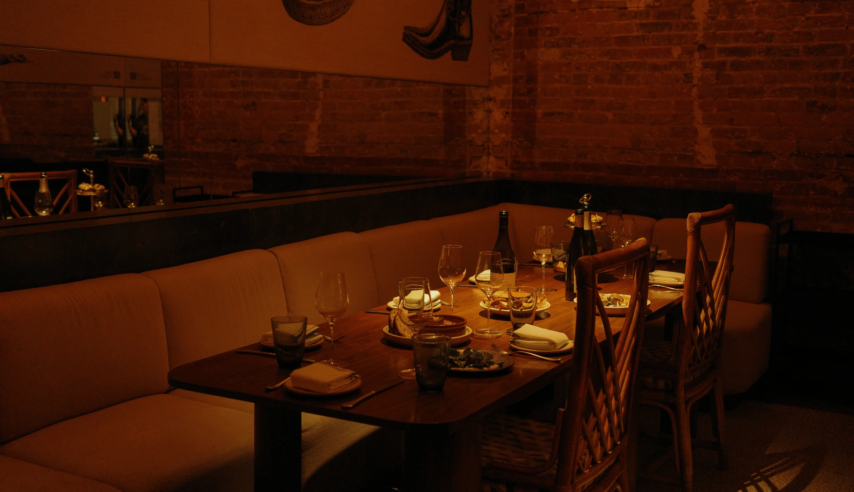 A beautifully set table for an immersive dining experience at La Compagnie des Vins Surnaturels, London, by the Experimental Group.