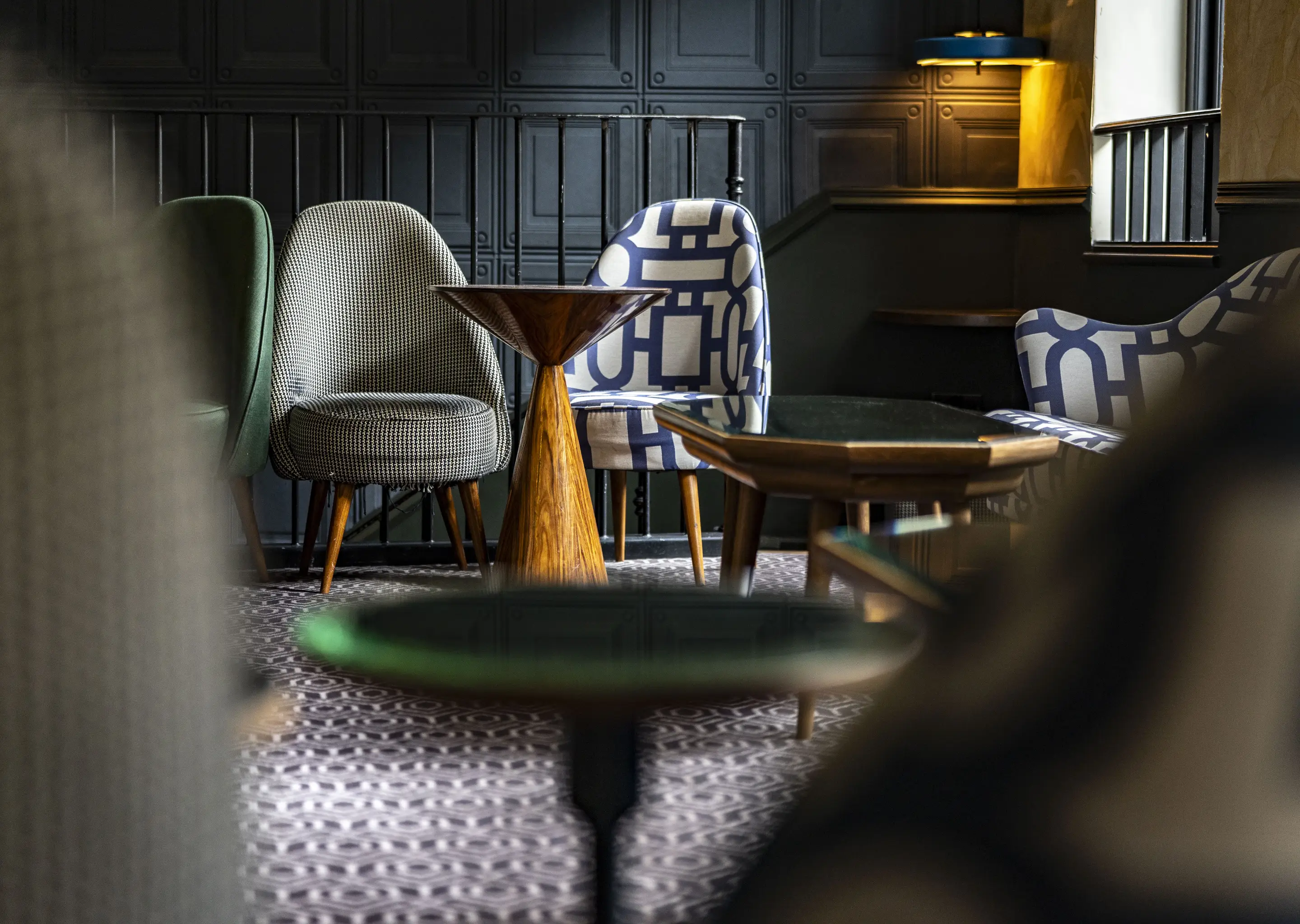 Lounge area with designer armchairs and contemporary decor, La Compagnie, Neal's Yard, Experimental Group.