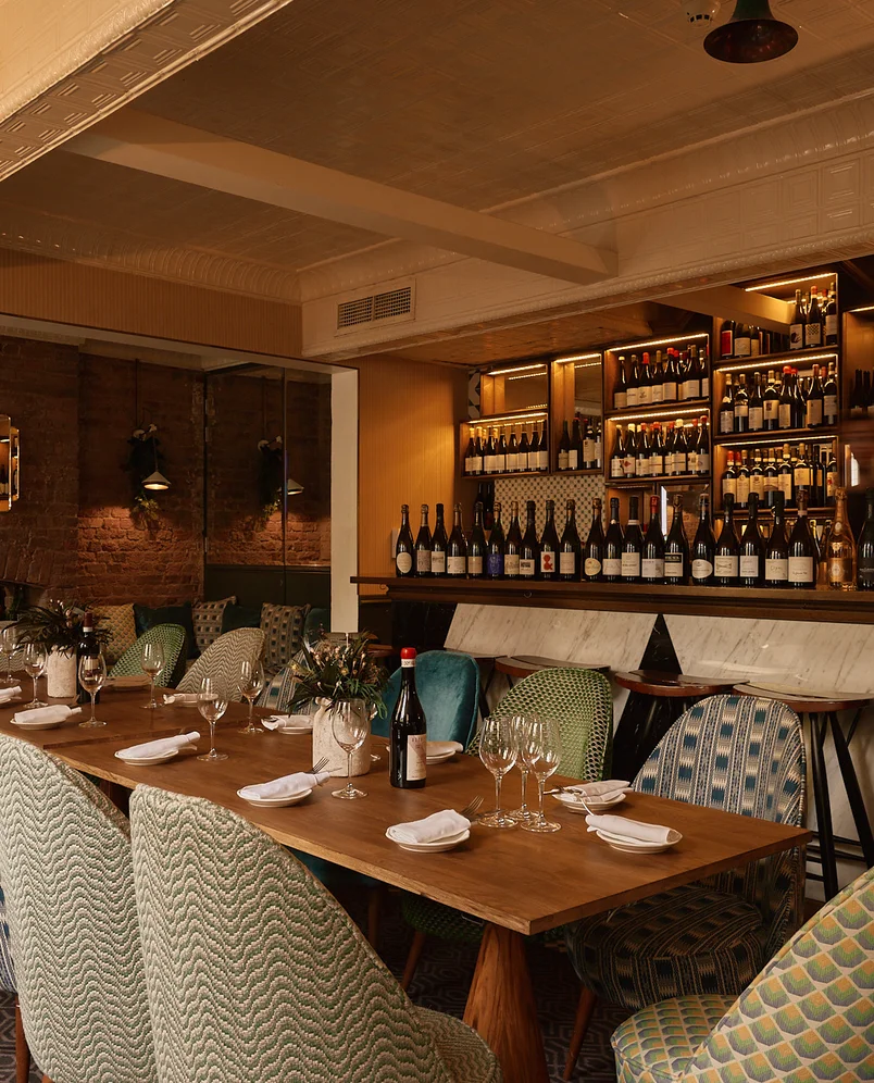 Elegant dining room with large table, La Compagnie, Neal's Yard, Experimental Group